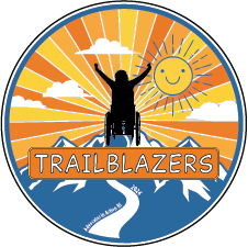 Silhouette of a person in a wheelchair, raising their arms in triumph on top of a mountain. This is the logo for Trailblazers, Rhode Island's 2026 Self-Advocacy conference.